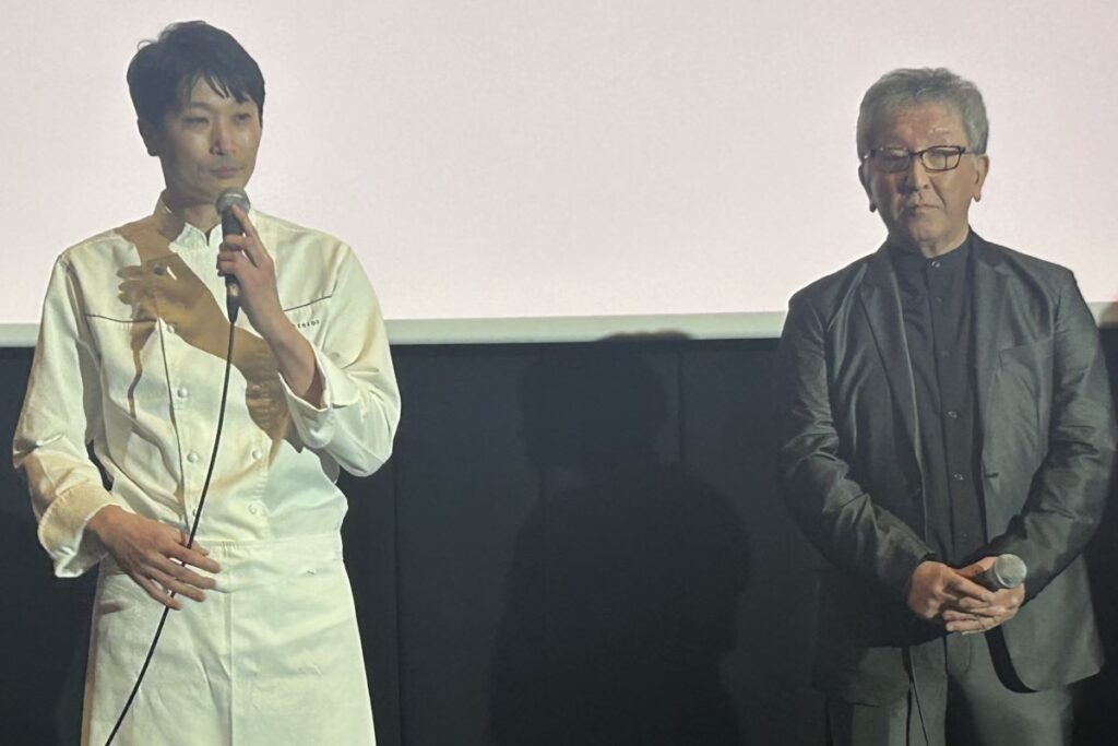フードアドバイザーを務めた塚田宏幸さん(左)と石村のモデルになった富樫さん